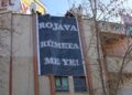Li Êlihê pankarta “Rojava rûmeta me ye” hate daliqandin