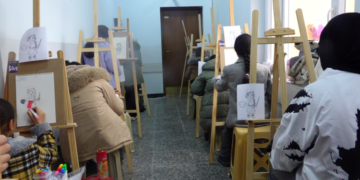 Zarok bi Rojava hestên neteweyî hîn dibin